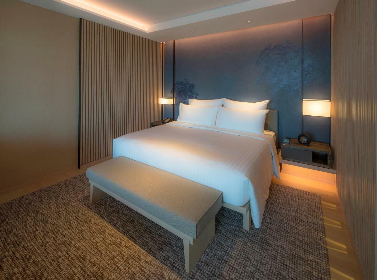 Mu Jiaoxi Hotel Exterior photo A bedroom at the hotel